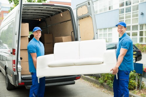 Moving boxes and furniture prepared for flat removals in Cranham